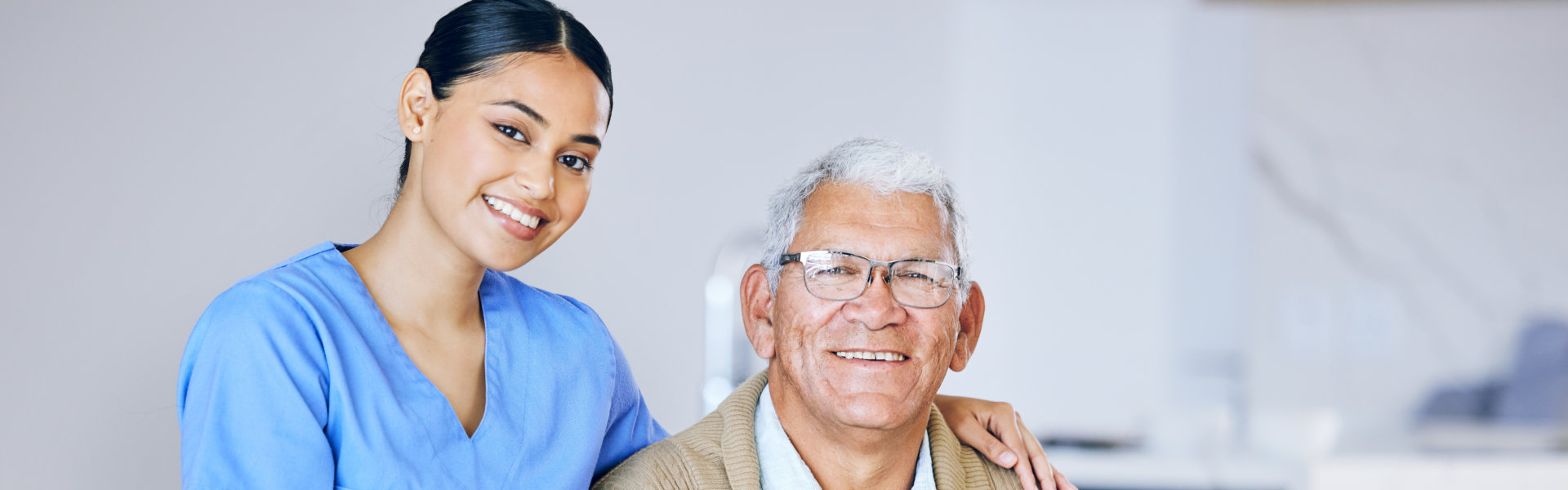 a elderly man and woman smiling